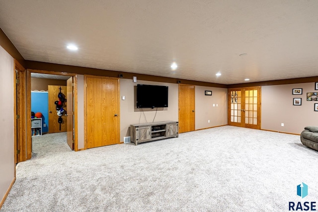 811 Southview Dr, Larchwood, IA 51241 - unfurnished living room with carpet, baseboards, and recessed lighting