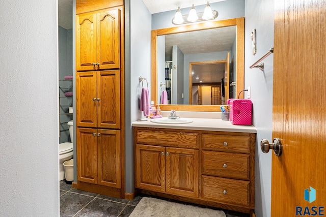 811 Southview Dr, Larchwood, IA 51241 - full bath with vanity, tile patterned floors, and toilet
