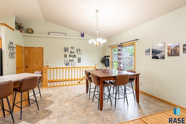 811 Southview Dr, Larchwood, IA 51241 - dining room with lofted ceiling and a chandelier
