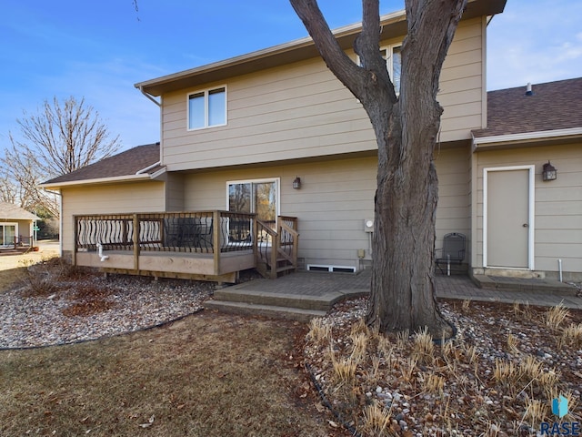 2904 E 52nd St, Sioux Falls, SD 57103 - rear view of property featuring a wooden deck, roof with shingles, and a patio area