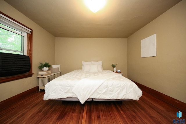 105 N 7th St, Beresford, SD 57004 - bedroom featuring hardwood / wood-style flooring and baseboards