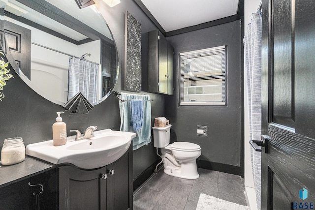 506 SW 8th Ave, Pipestone, MN 56164 - bathroom with toilet, baseboards, vanity, a textured wall, and curtained shower