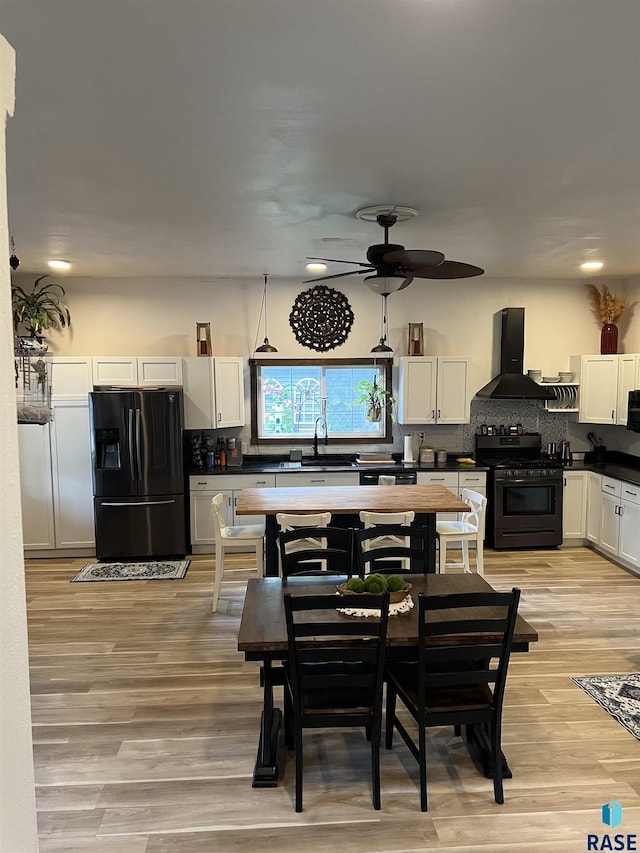 401 W 16th St, Tyndall, SD 57066 - dining room with ceiling fan, light wood-style flooring, and recessed lighting