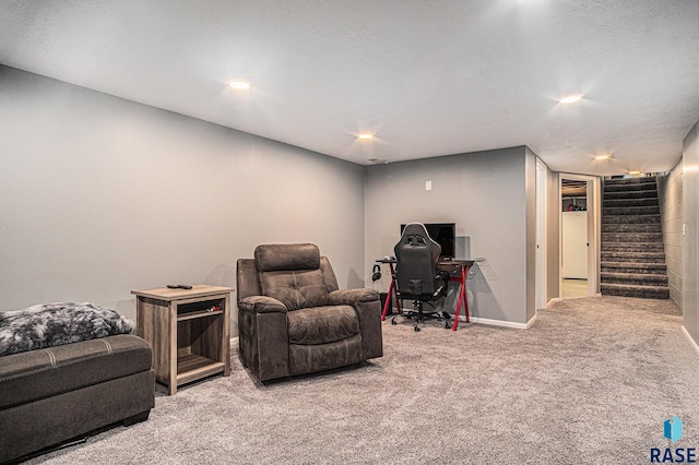 1034 N Elmwood Ave, Luverne, MN 56156 - sitting room with carpet floors, stairway, an office area, and baseboards