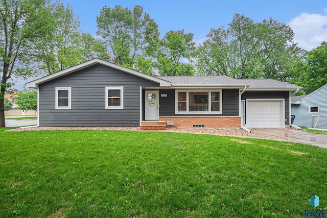 1034 N Elmwood Ave, Luverne, MN 56156 - ranch-style house with an attached garage, driveway, and a front yard