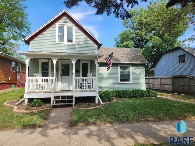 912 N Spring Ave, Sioux Falls, SD 57104 - view of front facade featuring covered porch