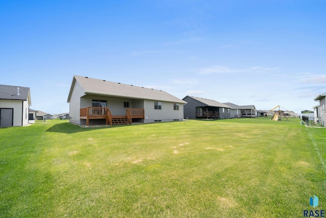 525 Quartzite Ave, Tea, SD 57064 - back of house with a lawn, crawl space, a deck, and a residential view