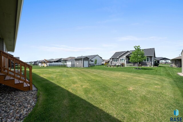 525 Quartzite Ave, Tea, SD 57064 - view of green lawn featuring a residential view