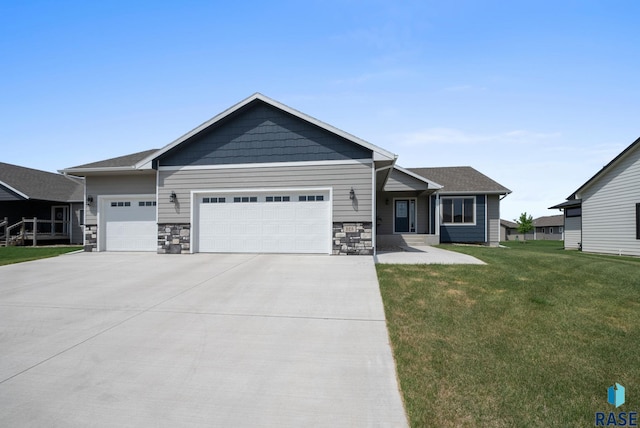 525 Quartzite Ave, Tea, SD 57064 - craftsman-style house with a garage, driveway, and a front yard
