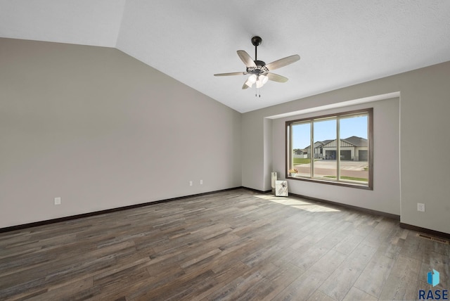 525 Quartzite Ave, Tea, SD 57064 - empty room featuring lofted ceiling, a ceiling fan, wood finished floors, and baseboards