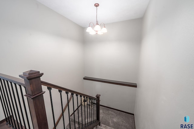 525 Quartzite Ave, Tea, SD 57064 - staircase with carpet, a chandelier, and baseboards