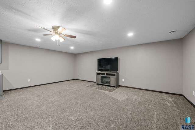 525 Quartzite Ave, Tea, SD 57064 - unfurnished living room featuring a ceiling fan, light colored carpet, baseboards, and recessed lighting