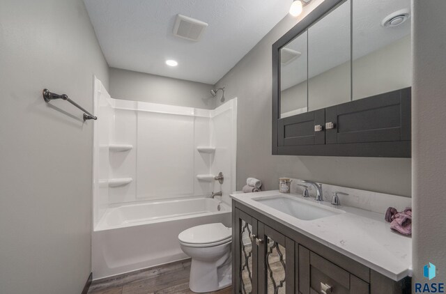 525 Quartzite Ave, Tea, SD 57064 - full bathroom featuring wood finished floors, toilet, shower / bath combination, and vanity