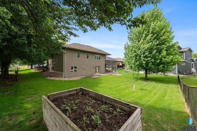 5516 S Tierney Pl, Sioux Falls, SD 57108 - view of yard with a garden
