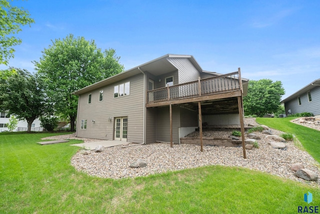 5516 S Tierney Pl, Sioux Falls, SD 57108 - rear view of house featuring a lawn and a deck