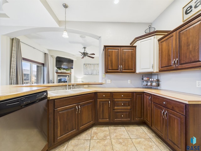 8113 S Copper Ridge Rd, Sioux Falls, SD 57108 - kitchen featuring dishwasher, a sink, a ceiling fan, light countertops, and light tile patterned floors