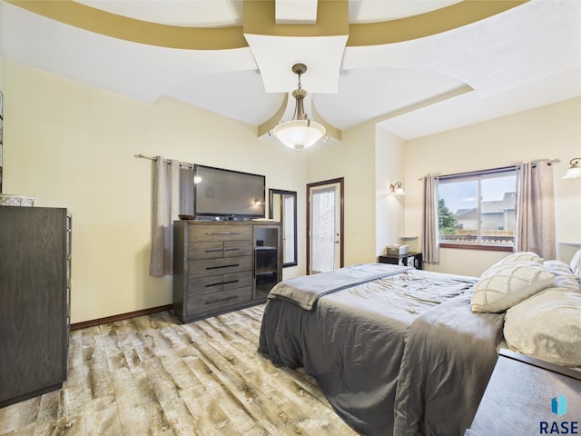 8113 S Copper Ridge Rd, Sioux Falls, SD 57108 - bedroom featuring wood finished floors and baseboards