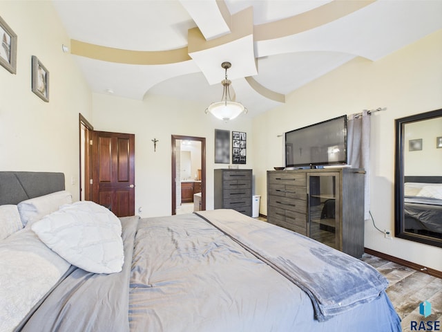 8113 S Copper Ridge Rd, Sioux Falls, SD 57108 - bedroom with wood finished floors, baseboards, and ensuite bath