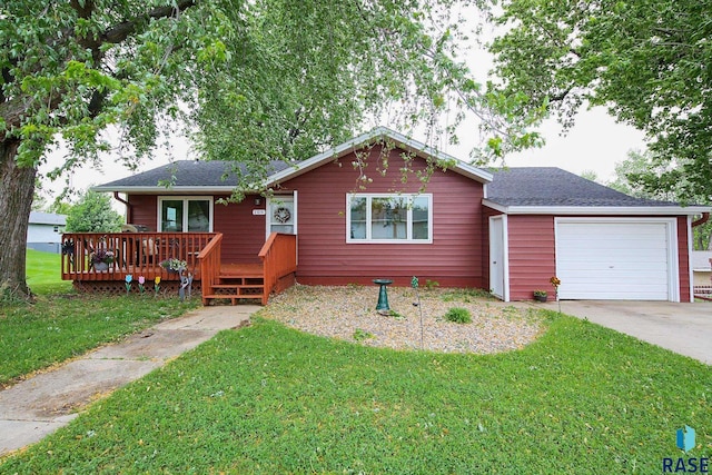 109 N Frank Ave, Garretson, SD 57030 - ranch-style home featuring an attached garage, driveway, a front lawn, and a shingled roof