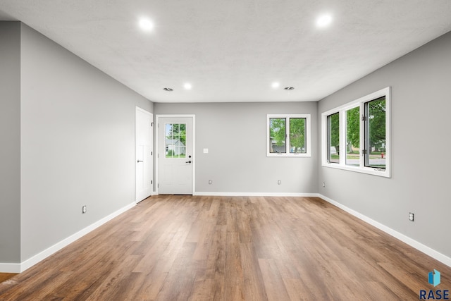 331 E Norton Ave, Salem, SD 57058 - spare room with recessed lighting, wood finished floors, and baseboards