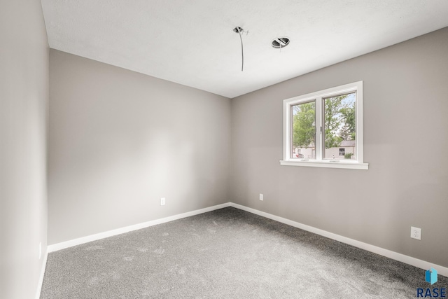 331 E Norton Ave, Salem, SD 57058 - carpeted empty room featuring baseboards
