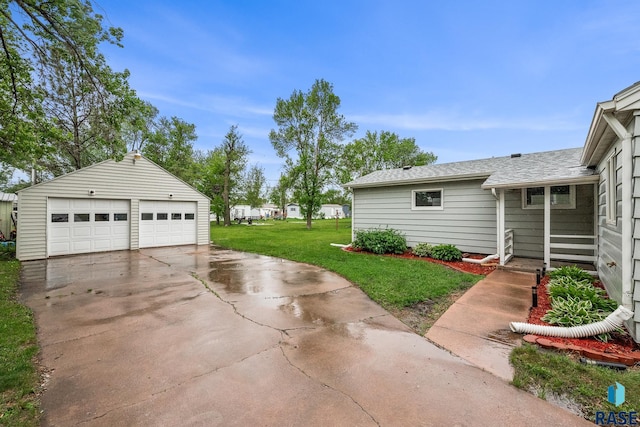 331 E Norton Ave, Salem, SD 57058 - view of grassy yard with an outdoor structure and a garage