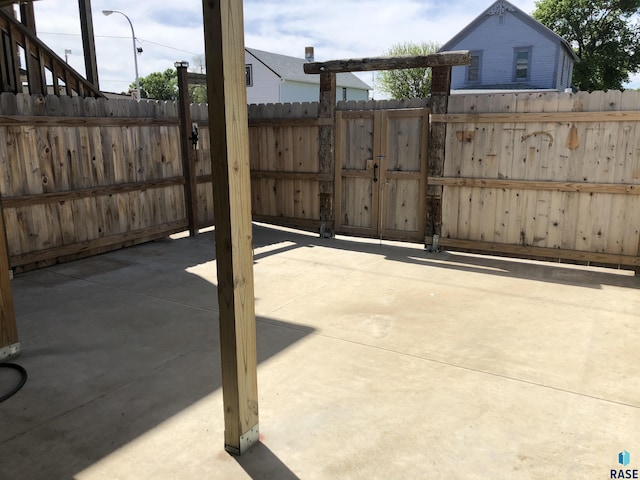 231 S 5th St, Menno, SD 57045 - view of patio featuring a gate