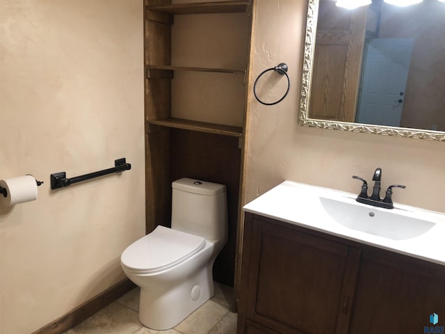 231 S 5th St, Menno, SD 57045 - half bath with toilet, vanity, and tile patterned floors