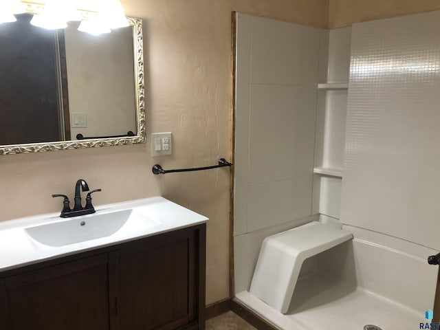 231 S 5th St, Menno, SD 57045 - full bathroom featuring a stall shower and vanity