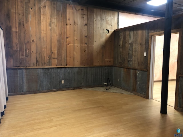 231 S 5th St, Menno, SD 57045 - unfurnished room with wood walls and wood finished floors