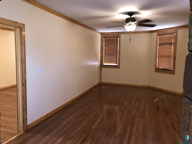 231 S 5th St, Menno, SD 57045 - empty room featuring a ceiling fan, wood finished floors, and baseboards