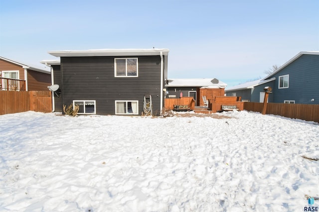 5813 W Clay St, Sioux Falls, SD 57106 - snow covered property with a deck