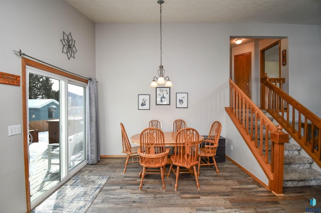 5813 W Clay St, Sioux Falls, SD 57106 - dining room with wood finished floors, stairs, baseboards, and a chandelier