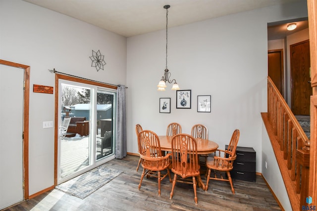 5813 W Clay St, Sioux Falls, SD 57106 - dining area with wood finished floors, stairway, a chandelier, and baseboards