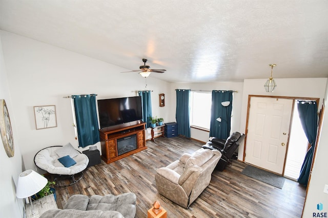 5813 W Clay St, Sioux Falls, SD 57106 - living area featuring wood finished floors, ceiling fan, and a glass covered fireplace