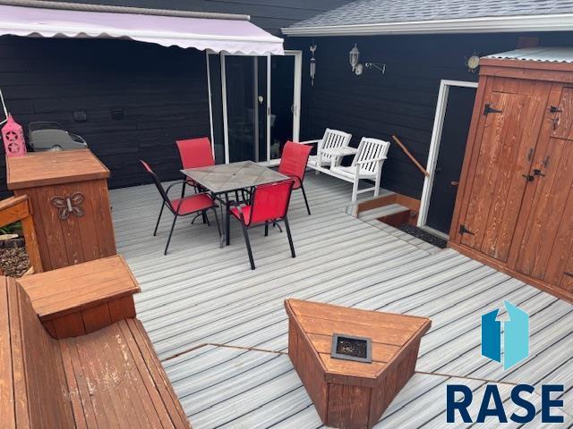 5813 W Clay St, Sioux Falls, SD 57106 - deck featuring outdoor dining space