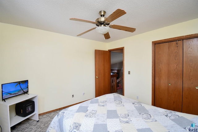 5813 W Clay St, Sioux Falls, SD 57106 - bedroom featuring a closet, a ceiling fan, and a textured ceiling