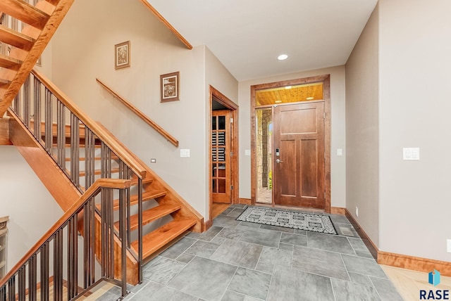 2502 S Big Timber Pl, Sioux Falls, SD 57105 - entryway with baseboards, stairway, recessed lighting, and stone finish flooring