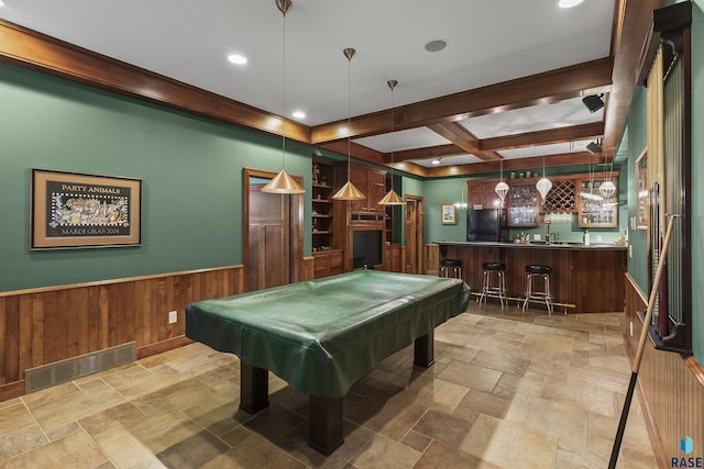 2502 S Big Timber Pl, Sioux Falls, SD 57105 - recreation room featuring wet bar, stone finish flooring, a wainscoted wall, wood walls, and billiards
