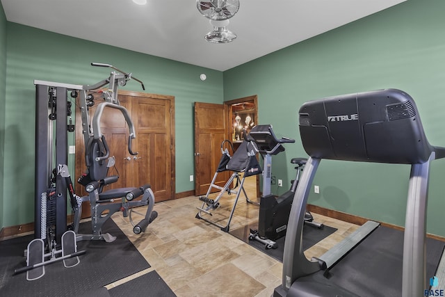 2502 S Big Timber Pl, Sioux Falls, SD 57105 - workout room featuring stone finish flooring
