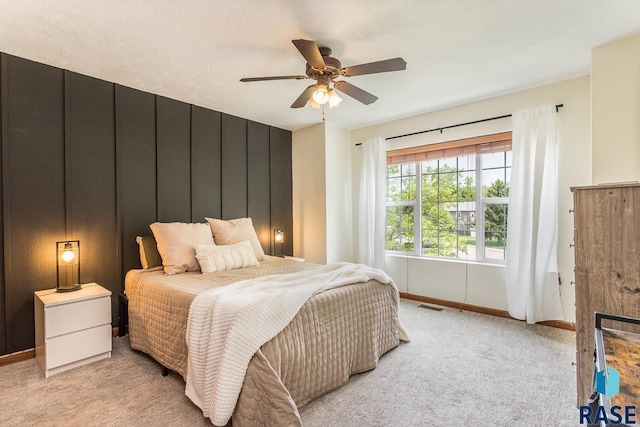 1808 S Mulberry Ave Unit D, Brandon, SD 57005 - bedroom featuring baseboards, light colored carpet, and ceiling fan