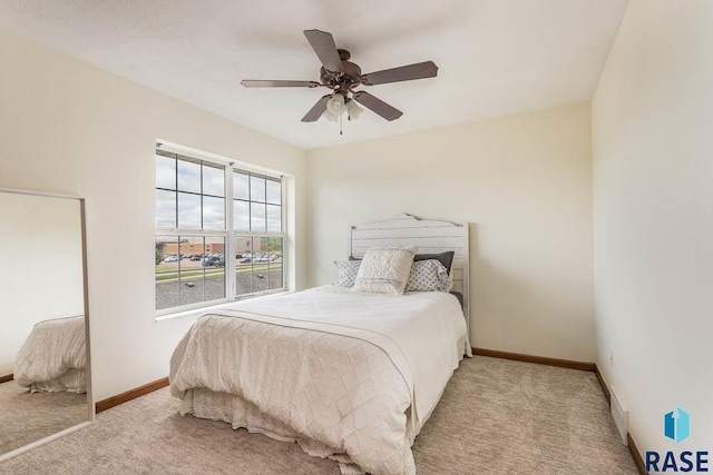 1808 S Mulberry Ave Unit D, Brandon, SD 57005 - carpeted bedroom with baseboards and a ceiling fan