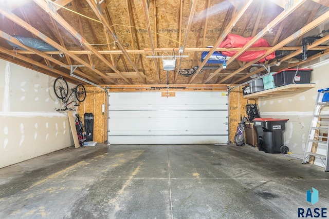 1808 S Mulberry Ave Unit D, Brandon, SD 57005 - garage featuring a garage door opener