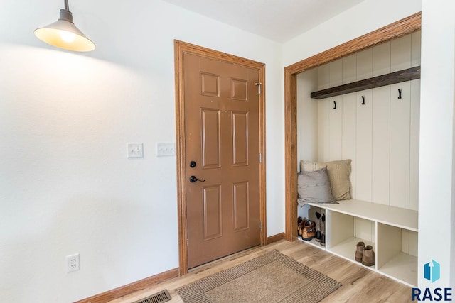 1808 S Mulberry Ave Unit D, Brandon, SD 57005 - mudroom featuring wood finished floors and baseboards