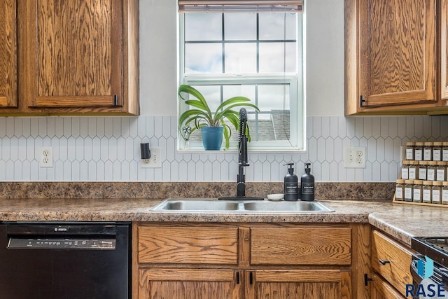 1808 S Mulberry Ave Unit D, Brandon, SD 57005 - kitchen featuring black dishwasher, a sink, backsplash, and brown cabinets