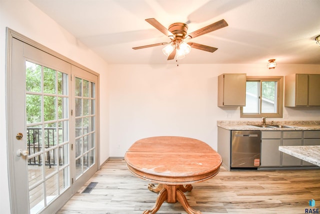 4301 E 28th St, Sioux Falls, SD 57103 - kitchen featuring a sink, stainless steel dishwasher, healthy amount of natural light, and light wood-style flooring