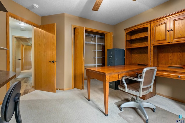 6700 W Snowberry Cir, Sioux Falls, SD 57106 - office space with light carpet, ceiling fan, baseboards, and a textured ceiling