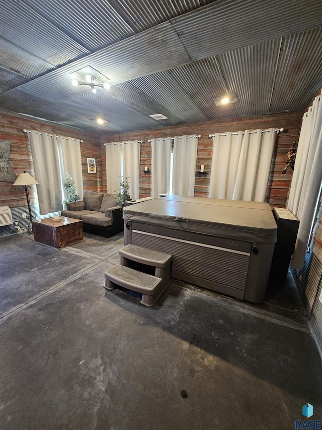 511 N 3rd St, Emery, SD 57332 - miscellaneous room featuring concrete floors and wooden walls