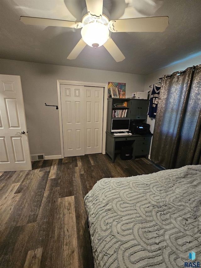 511 N 3rd St, Emery, SD 57332 - bedroom featuring dark wood-style floors, ceiling fan, and baseboards