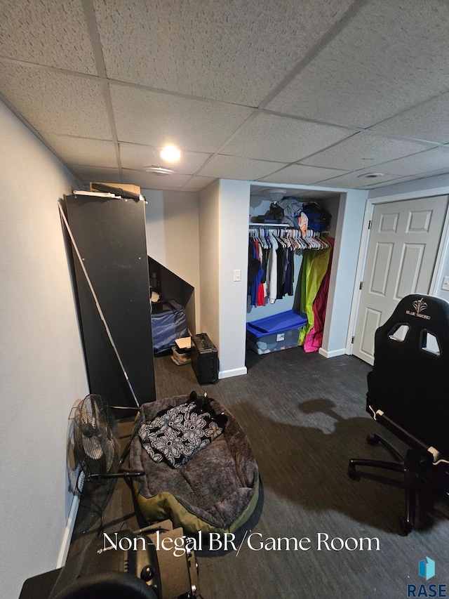 511 N 3rd St, Emery, SD 57332 - finished basement with a paneled ceiling and baseboards